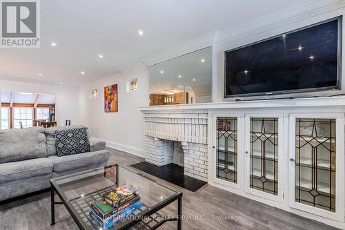 Mainsecondfloors - 47 Maxwell Avenue, Toronto, ON - Indoor Photo Showing Living Room With Fireplace