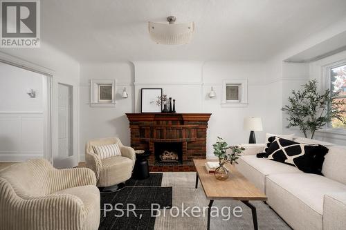 217 Northcliffe Boulevard, Toronto, ON - Indoor Photo Showing Living Room With Fireplace