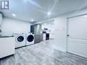Bsmt - 1347 Victoria Park Avenue, Toronto, ON  - Indoor Photo Showing Laundry Room 