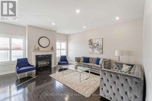 Upper - 766 Miltonbrook Crescent, Milton, ON - Indoor Photo Showing Living Room With Fireplace