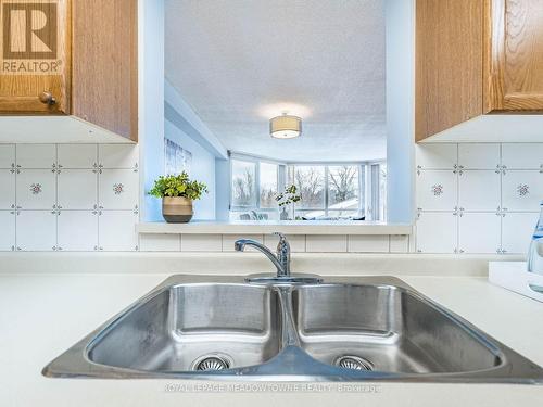 Clear view to open concept living area - 306 - 26 Hall Road, Halton Hills, ON - Indoor Photo Showing Kitchen With Double Sink