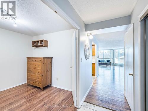 Double door entry to den - 306 - 26 Hall Road, Halton Hills, ON - Indoor Photo Showing Other Room