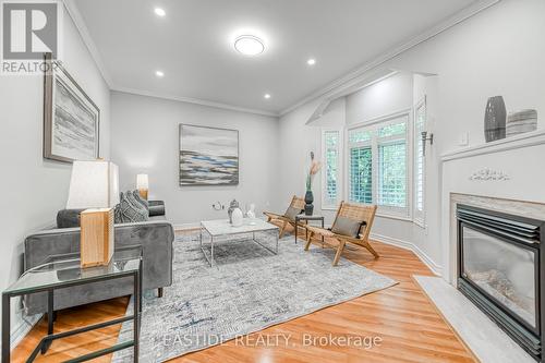 2422 Hertfordshire Way, Oakville, ON - Indoor Photo Showing Living Room With Fireplace