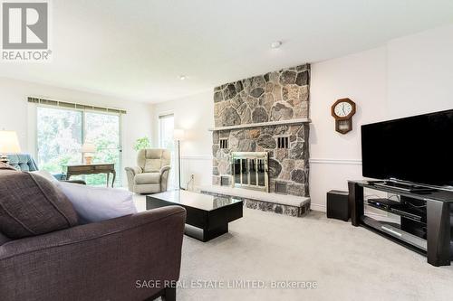 1859 Sherwood Forrest Circle, Mississauga, ON - Indoor Photo Showing Living Room With Fireplace