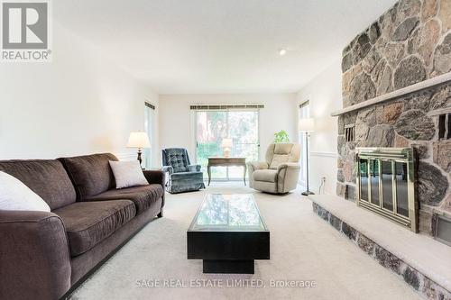 1859 Sherwood Forrest Circle, Mississauga, ON - Indoor Photo Showing Living Room With Fireplace