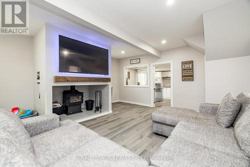 10528 Van Allen Road, North Dundas, ON - Indoor Photo Showing Living Room With Fireplace