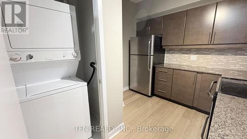 504 - 33 Bay Street, Toronto, ON - Indoor Photo Showing Laundry Room