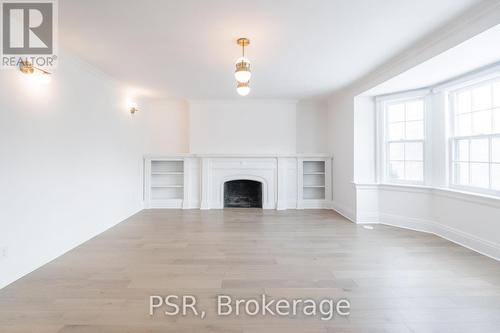 25 Coulson Avenue, Toronto, ON - Indoor With Fireplace