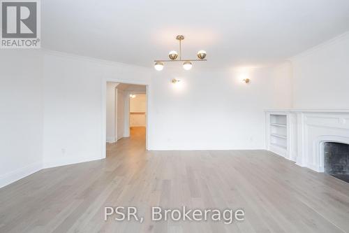 25 Coulson Avenue, Toronto, ON - Indoor With Fireplace