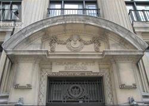 407 - 73 Richmond Street W, Toronto, ON - Indoor Photo Showing Other Room With Fireplace
