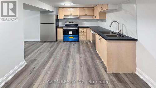 7 Heaslip Terrace, Toronto, ON - Indoor Photo Showing Kitchen With Double Sink