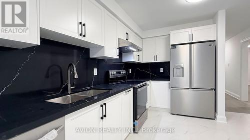 7 Heaslip Terrace, Toronto, ON - Indoor Photo Showing Kitchen With Double Sink