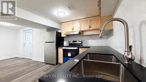 7 Heaslip Terrace, Toronto, ON - Indoor Photo Showing Kitchen With Double Sink