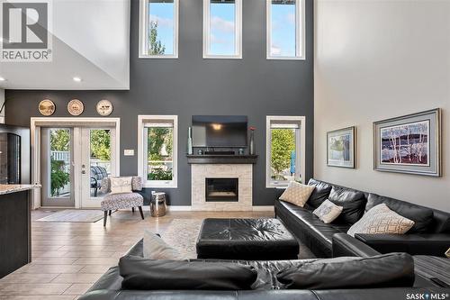 210 Clubhouse Boulevard, Warman, SK - Indoor Photo Showing Living Room With Fireplace