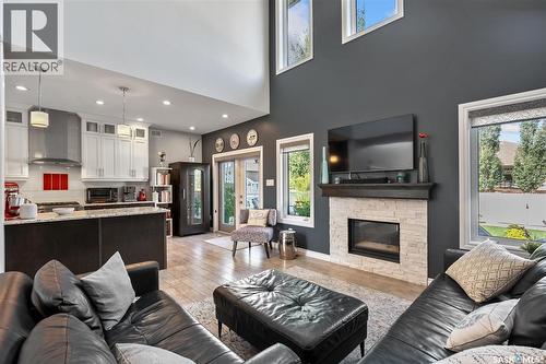210 Clubhouse Boulevard, Warman, SK - Indoor Photo Showing Living Room With Fireplace