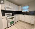 5120 Dewdney Avenue, Regina, SK  - Indoor Photo Showing Kitchen With Double Sink 