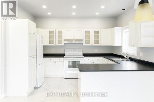 Upper - 235 Pineland Court, Waterloo, ON - Indoor Photo Showing Kitchen With Double Sink