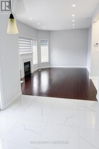 Upper - 235 Pineland Court, Waterloo, ON - Indoor Photo Showing Other Room With Fireplace