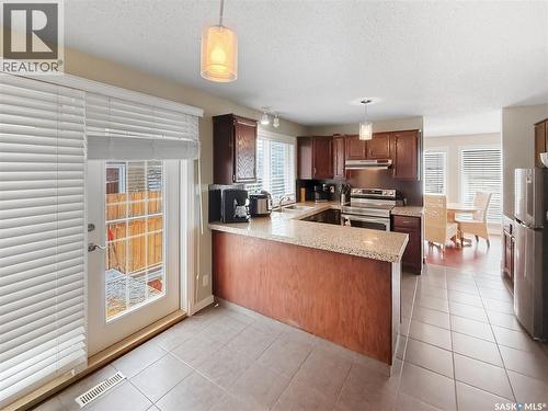 344 Battleford Trail, Swift Current, SK - Indoor Photo Showing Kitchen With Double Sink
