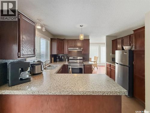 344 Battleford Trail, Swift Current, SK - Indoor Photo Showing Kitchen With Double Sink