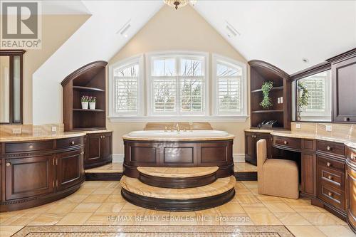 Stand alone bathtub with vaulted ceilings. - 574 Conservation Drive, Brampton, ON - Indoor Photo Showing Bathroom