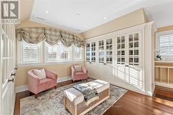 Sitting area in walk-in closet. - 