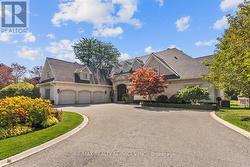 Parking for 25+ cars plus 4 car heated garage. - 