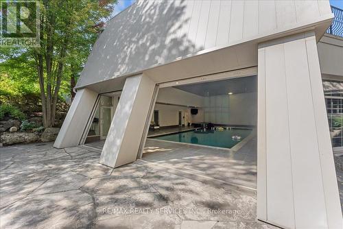 Retractable doors allow indoor/outdoor living. - 574 Conservation Drive, Brampton, ON - Outdoor With Exterior