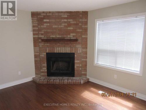 74 Hudson Drive, Brampton, ON - Indoor Photo Showing Living Room With Fireplace