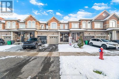 7 Dufay Road, Brampton, ON - Outdoor With Facade