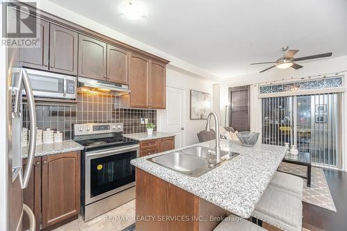 7 Dufay Road, Brampton, ON - Indoor Photo Showing Kitchen With Double Sink