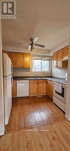 Bright Kitchen with window overlooking the front - 36 - 36 Dawson Crescent, Brampton, ON - Indoor Photo Showing Kitchen