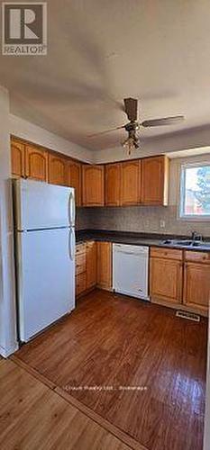 Bright Kitchen with tons of cupboards - 36 - 36 Dawson Crescent, Brampton, ON - Indoor Photo Showing Kitchen With Double Sink
