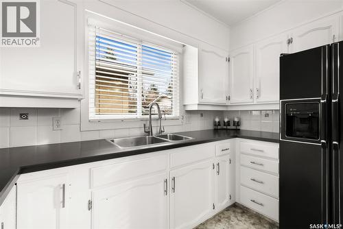 129 N Mccarthy Boulevard, Regina, SK - Indoor Photo Showing Kitchen With Double Sink