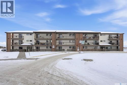 210 211 Tait Place, Saskatoon, SK - Outdoor With Facade