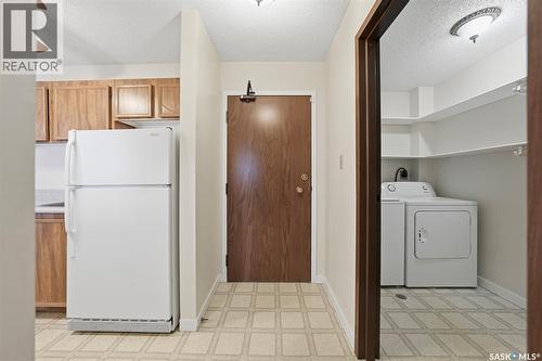 210 211 Tait Place, Saskatoon, SK - Indoor Photo Showing Laundry Room