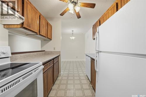 210 211 Tait Place, Saskatoon, SK - Indoor Photo Showing Kitchen