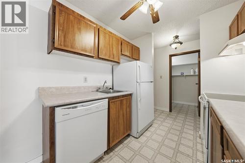 210 211 Tait Place, Saskatoon, SK - Indoor Photo Showing Kitchen