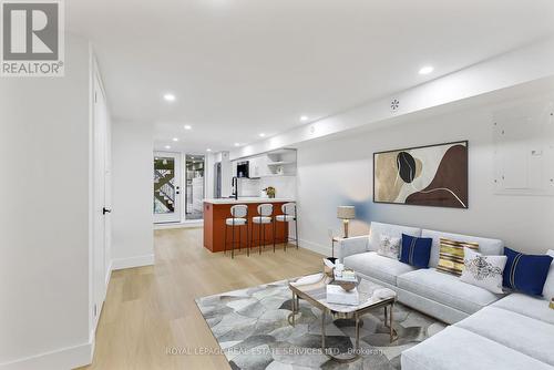 Basement - 396 Jones Avenue, Toronto, ON - Indoor Photo Showing Living Room