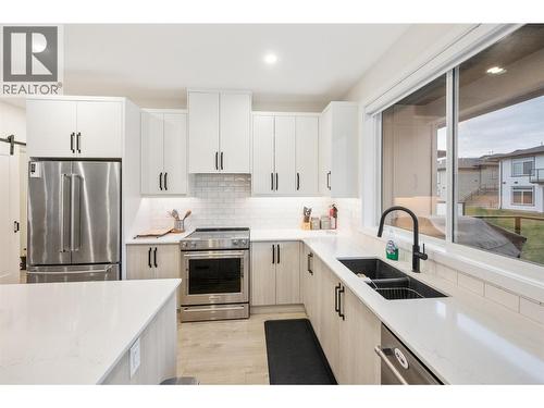 8000 Vedette Drive Unit# 22, Osoyoos, BC - Indoor Photo Showing Kitchen With Double Sink With Upgraded Kitchen