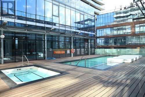Pool deck & hot tub - 2104 - 390 Cherry Street, Toronto, ON -  With In Ground Pool