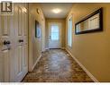 Doorway with baseboards and stone finish flooring - 87 Iron Gate Street, Kitchener, ON  - Indoor Photo Showing Other Room 