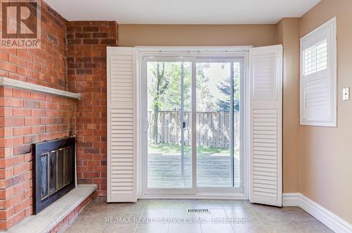 Upper - 4469 Gullfoot Circle, Mississauga, ON - Indoor Photo Showing Other Room With Fireplace