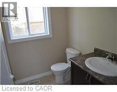 Bathroom with vanity and toilet - 55 Mooregate Crescent Unit# 2, Kitchener, ON - Indoor Photo Showing Bathroom
