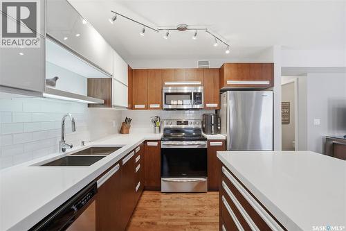 213 455 Rempel Lane, Saskatoon, SK - Indoor Photo Showing Kitchen With Stainless Steel Kitchen With Double Sink