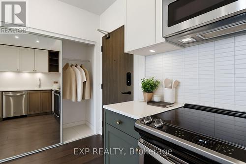 VIRTUALLY STAGED TO SHOW POSSIBILITIES - 730 - 100 Eagle Rock Way, Vaughan, ON - Indoor Photo Showing Kitchen With Stainless Steel Kitchen
