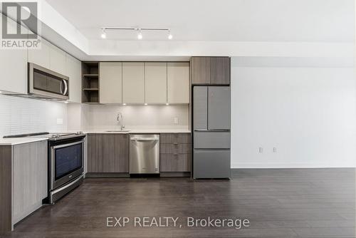 ORIGINAL - 730 - 100 Eagle Rock Way, Vaughan, ON - Indoor Photo Showing Kitchen With Upgraded Kitchen