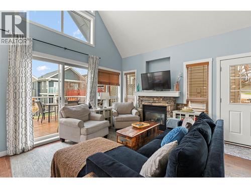 6837 Santiago Loop Unit# 134, Kelowna, BC - Indoor Photo Showing Living Room With Fireplace