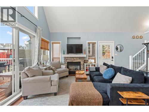 6837 Santiago Loop Unit# 134, Kelowna, BC - Indoor Photo Showing Living Room With Fireplace