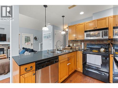 6837 Santiago Loop Unit# 134, Kelowna, BC - Indoor Photo Showing Kitchen With Double Sink